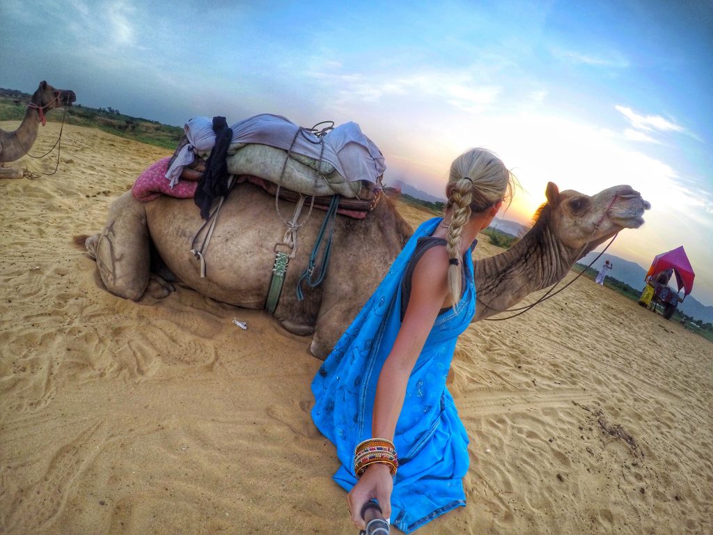 Bonding with a camel after a ride through the sand dunes in Pushkar