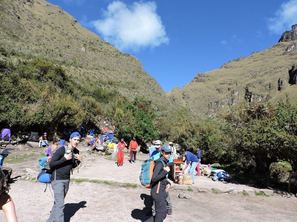 You can see the local Incas selling drinks and snacks to the hikers before the first/highest summit