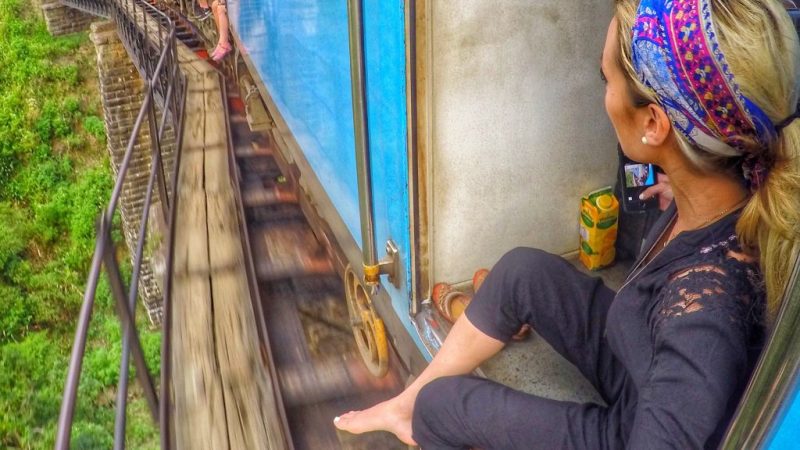 solo traveler girl on a train in sri lanka