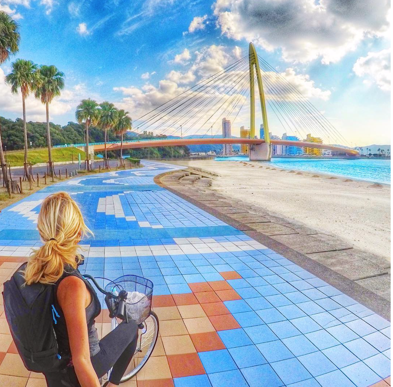 Sustainable traveler exploring city on bicycle