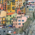 Everything you could possibly need to know to plan a trip to the iconic cities of Cinque Terre! From how to book cheap flights to Italy, to getting around the five cities of Cinque Terre by train, boat, or hiking!