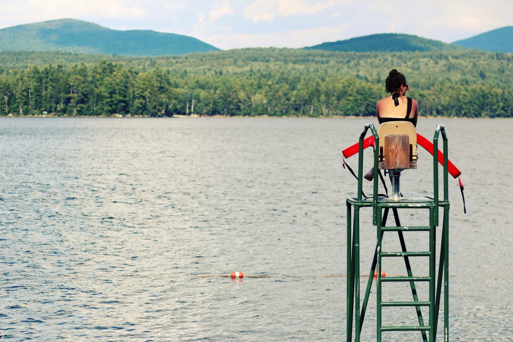 Become a lifeguard to earn some extra cash in the summer.