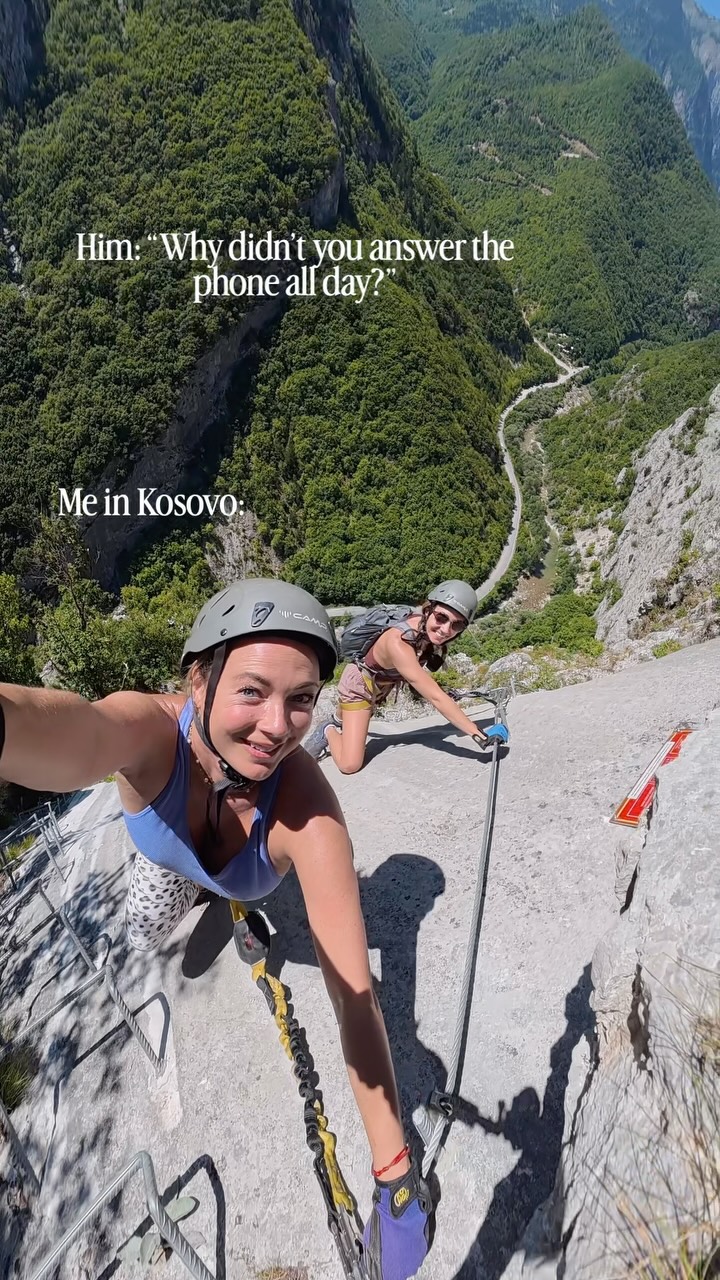 When he suspiciously asks why I didn’t answer the phone all day and I was literally scaling a mountain in Kosovo with my adventure bestie. 🧗‍♀️ 😁

I had no idea we were doing a Via Ferrata on our first day of the girls’ trip, and was actually scared, but it ended up being really fun!

If you’re up for an adventure, it’s in Peja, a beautiful mountain area! All of my travel tips are on my website, mylifesamovie.com !

Follow me @mylifesatravelmovie - one of the most experienced solo female travelers in the world, for unique destinations, extreme adventures, and actual useful information!