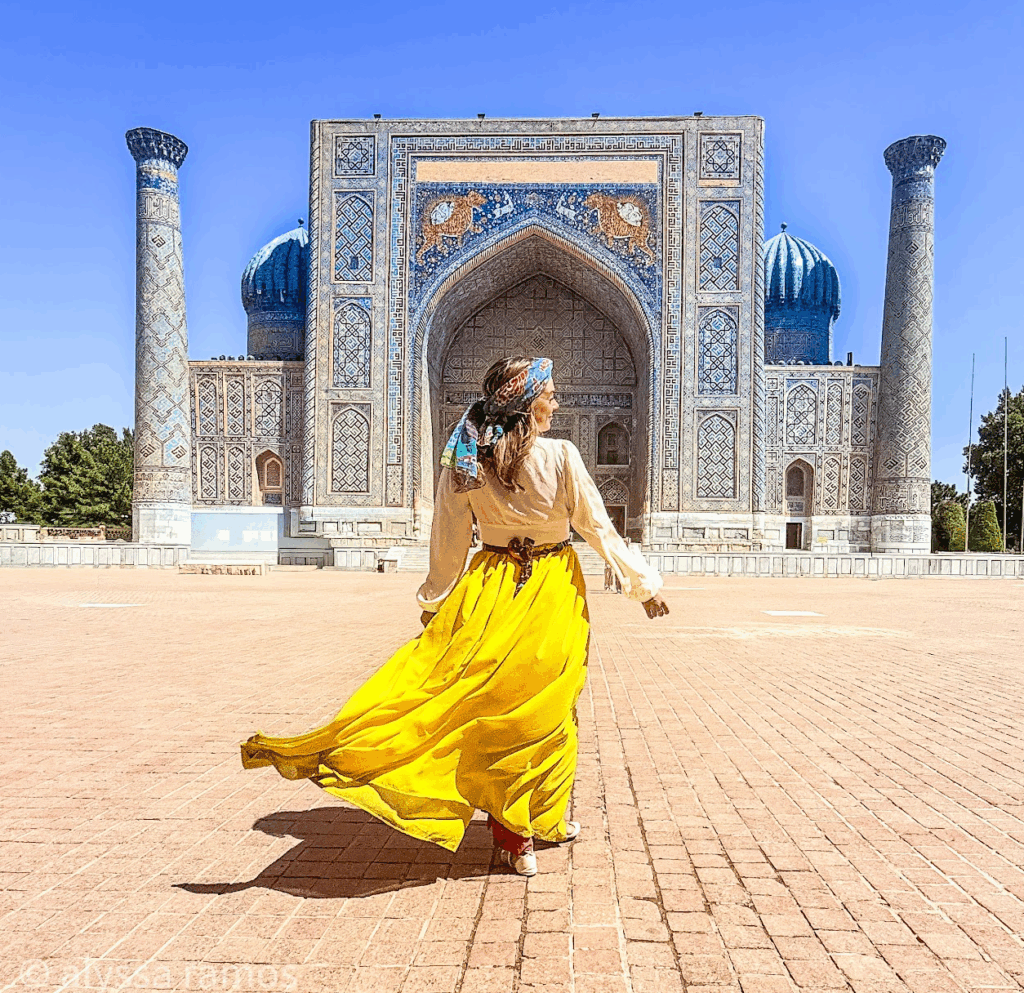 travel blogger alyssa ramos at registan square in samarkand uzbekistan