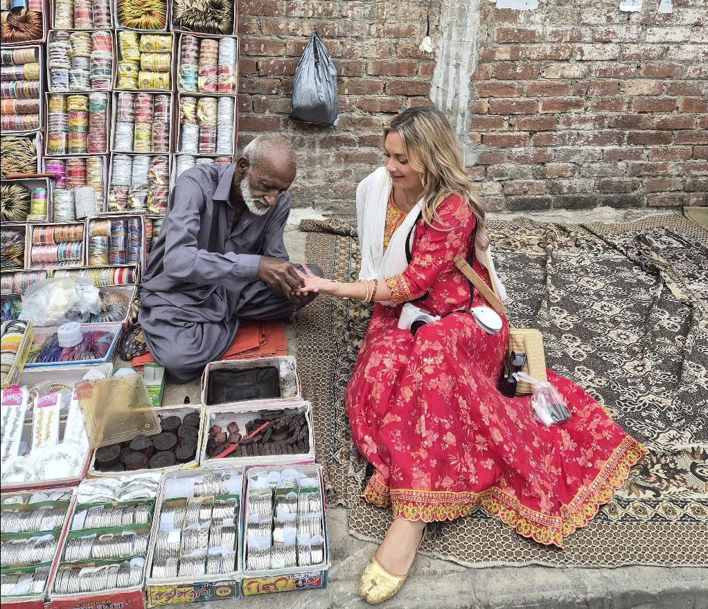 Solo female travel influencer Alyssa Ramos (@mylifesatravelmovie) in the bazaar of Lahore, Pakistan
