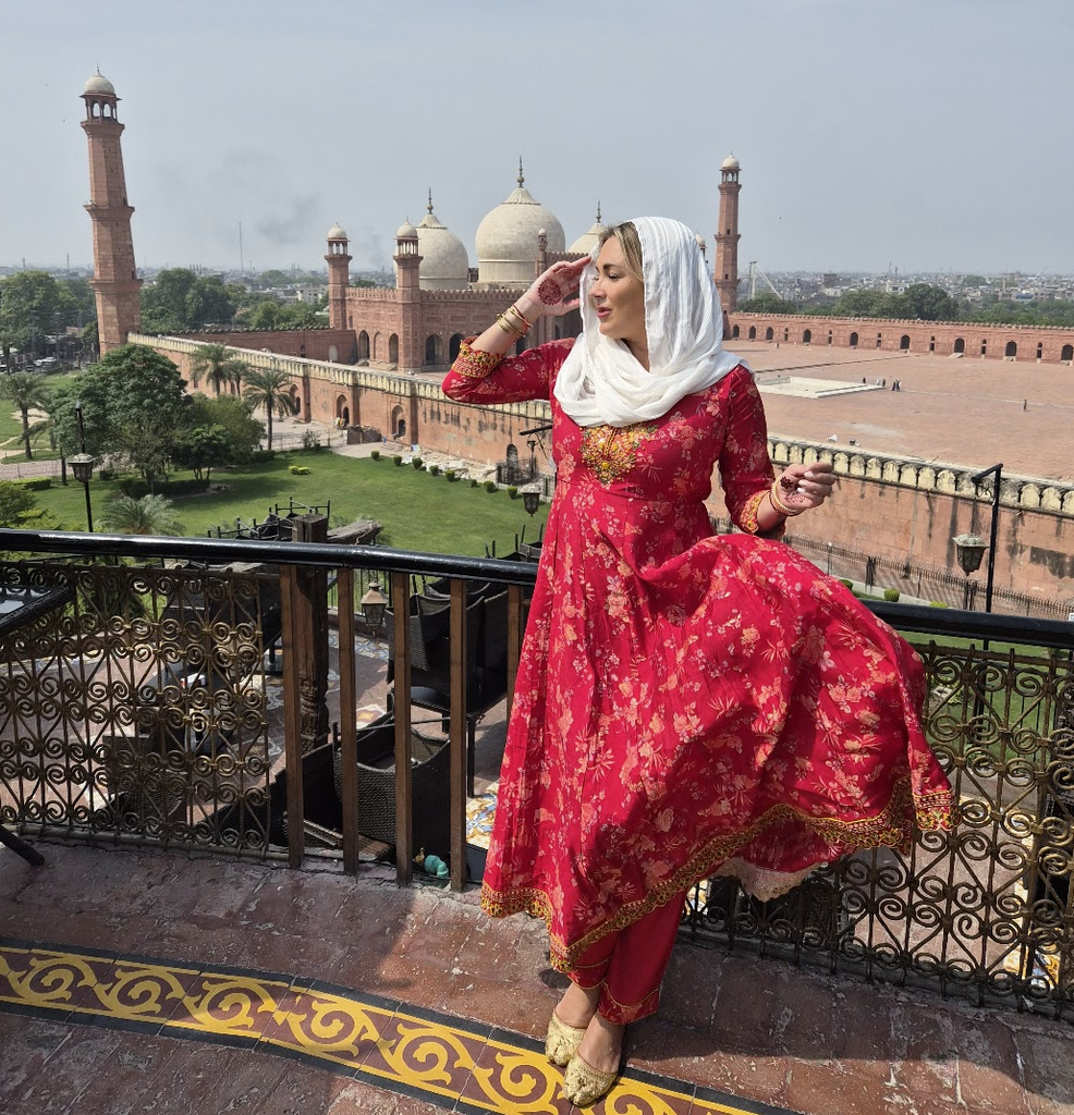 Solo female travel influencer Alyssa Ramos (@mylifesatravelmovie) at Haveli rooftop restaurant in Lahore Pakistan